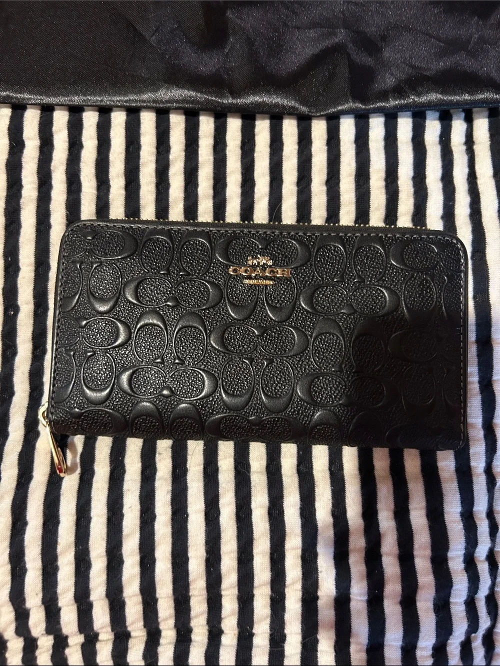 Coach Black Embossed Signature Zip Wallet with Gold Logo